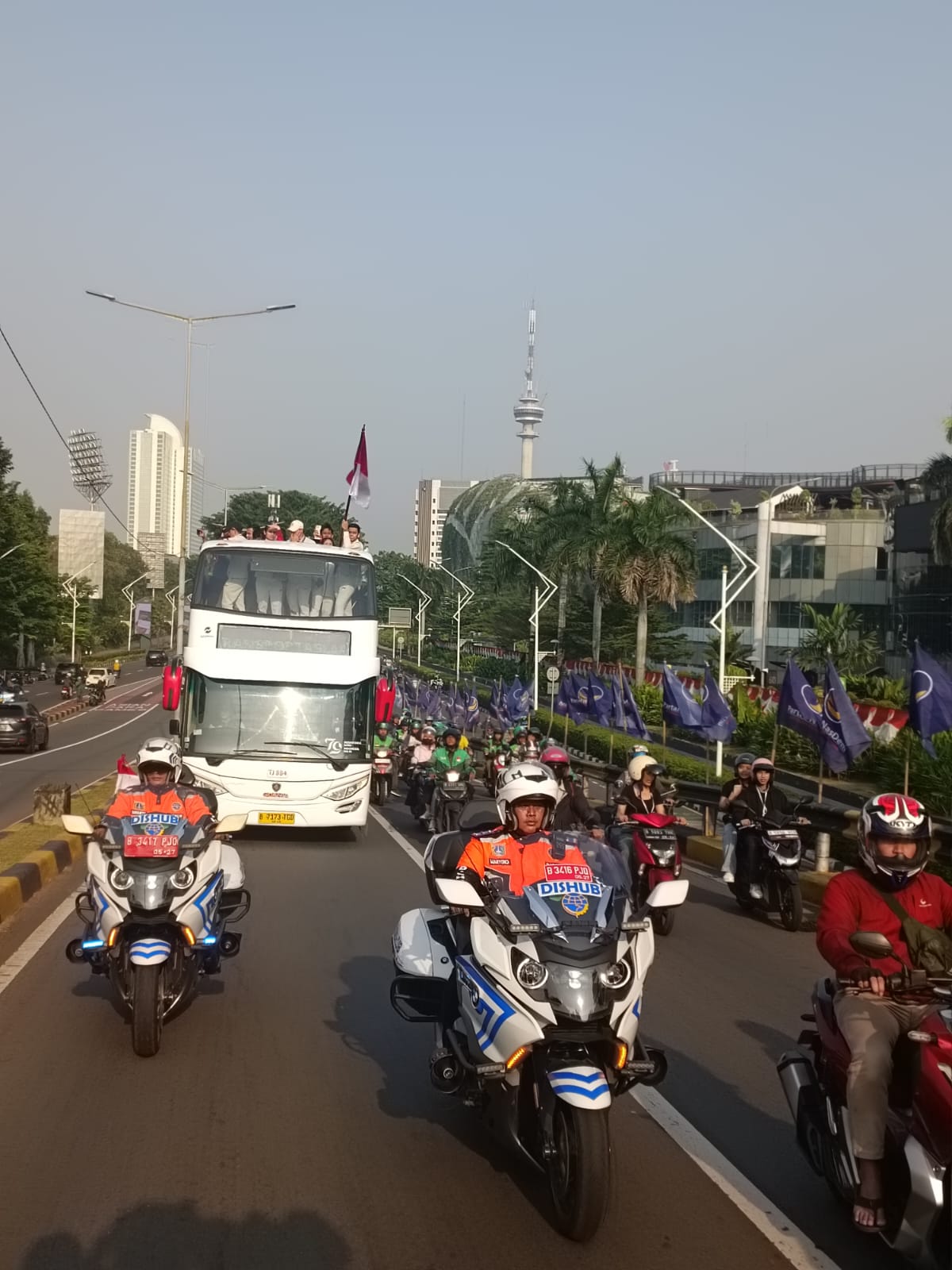 Pawai Kemenangan Olimpiade Paris 2024: Veddriq, Rizki, dan Gregoria Disambut Meriah di Jakarta